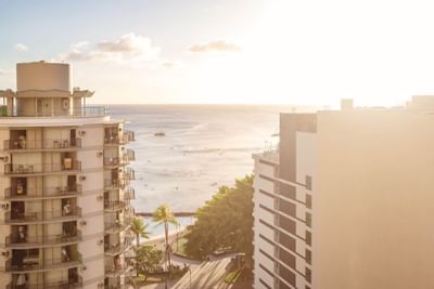 Serene view of the ocean from a balcony on a sunny day at Waikiki Resort Hotel by Sono