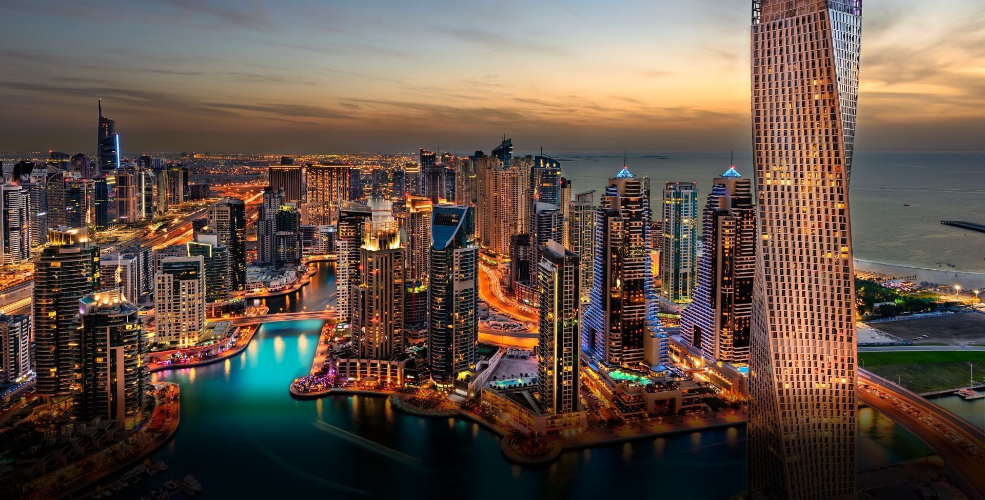 Aerial night view of DAMAC Hotels & Resorts and city which is one of the 5 stars hotel in Dubai