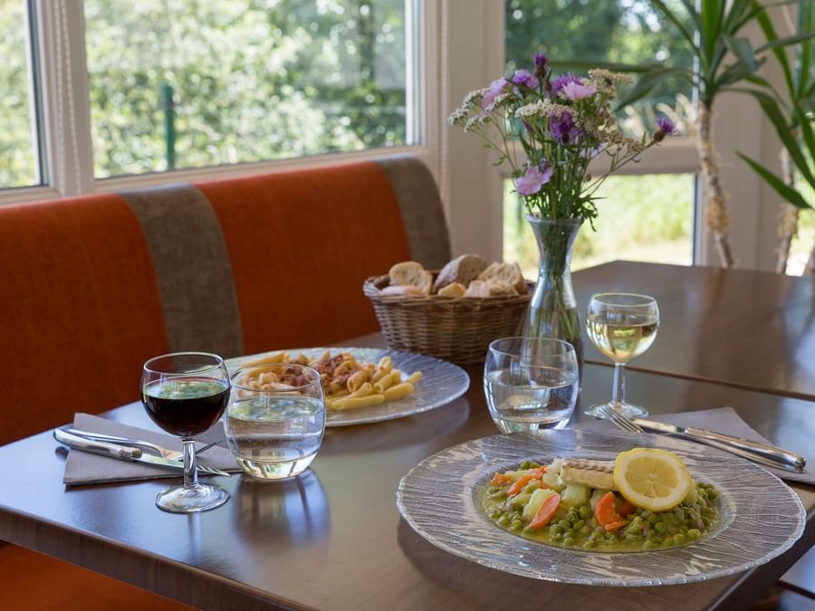 Meals served with wine at Hotel Tulle
