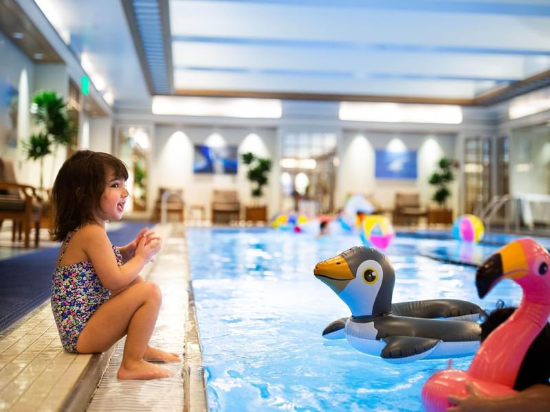 children playing in the pool