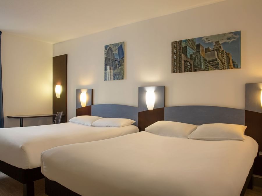 A view of a Quadruple bed Room at The Originals Hotels