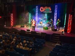 A band performing at Cactus Theater near MCM Hotel Lubbock