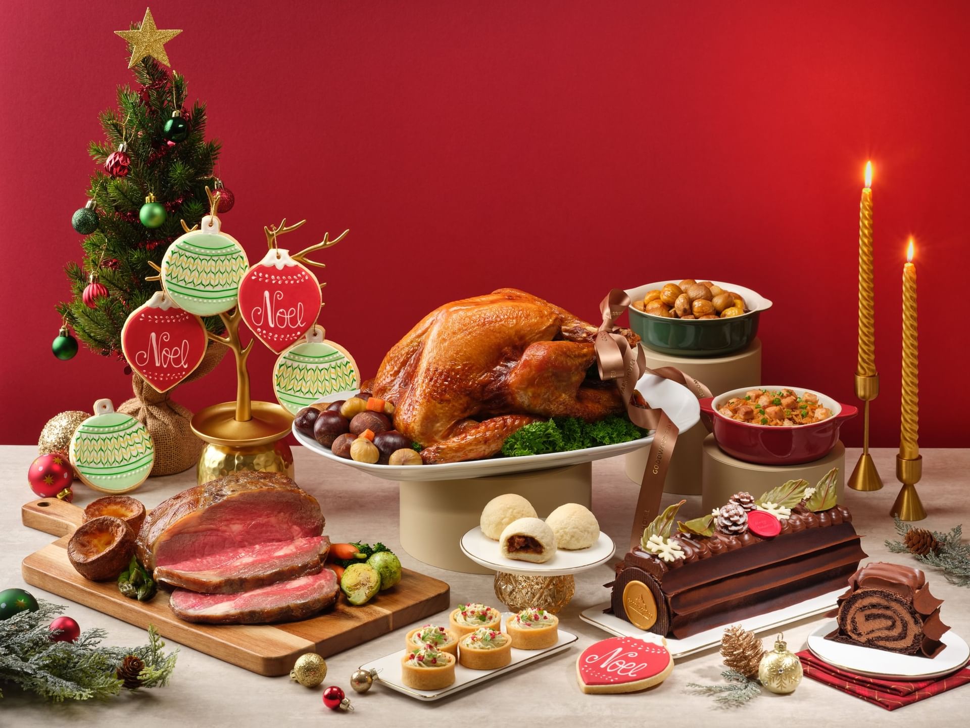 A full festive feast spread with roast turkey prime rib and a Goodwood Park Hotel chocolate Yule Log cake