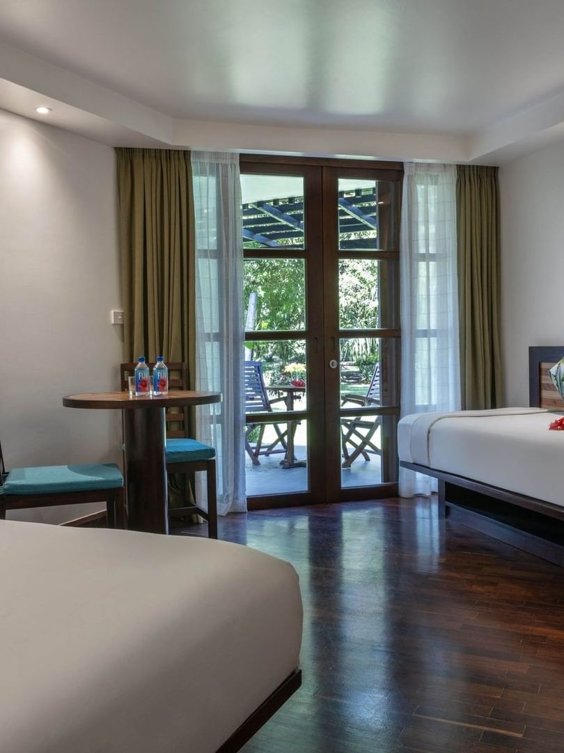 Garden View Rooms with two beds and a balcony at Warwick Fiji Resort and Spa, Korolevu.