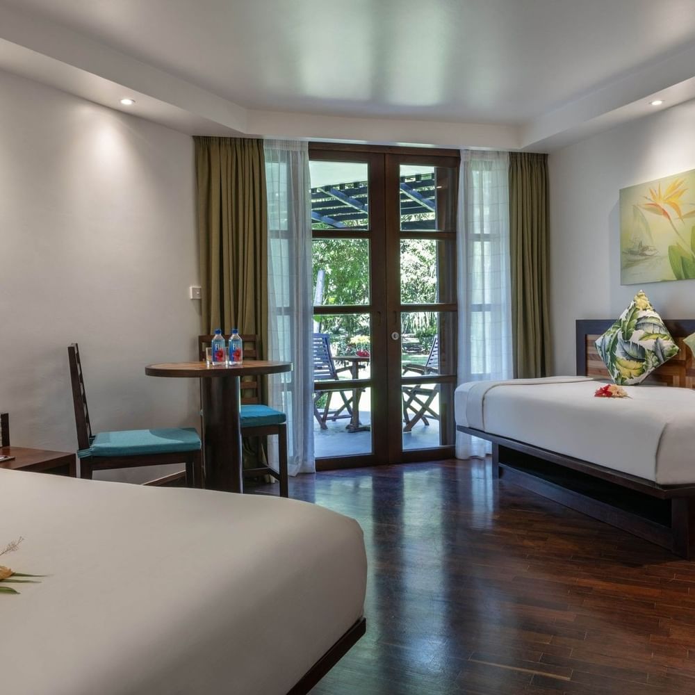 Garden View Rooms with two beds and a balcony at Warwick Fiji Resort and Spa, Korolevu.