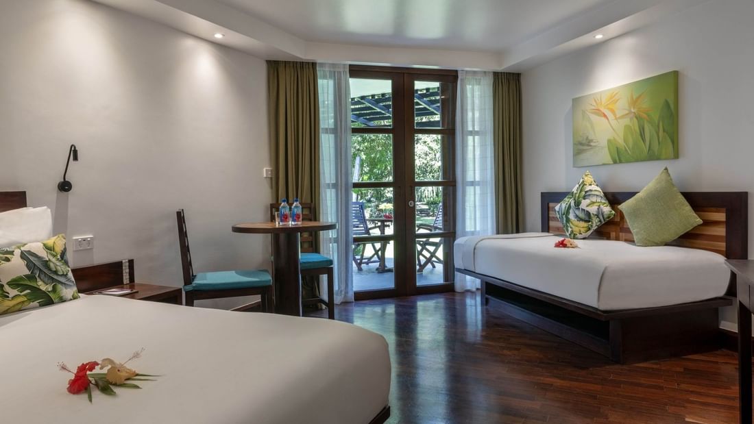 Garden View Rooms with two beds and a balcony at Warwick Fiji Resort and Spa, Korolevu.