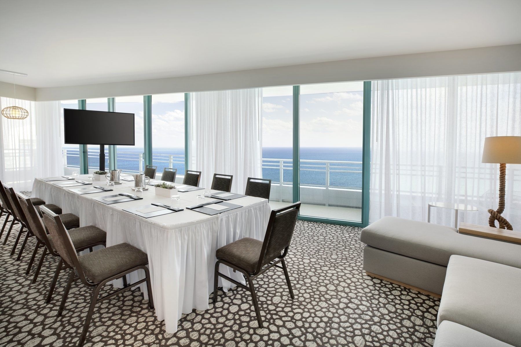 Boardroom & lounge area in corner Suite at Diplomat Resort