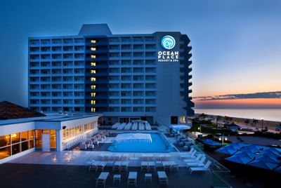 Exterior view of the Ocean Place Resort and Spa at dawn