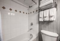 All our guest bathrooms include a shower/tub combination