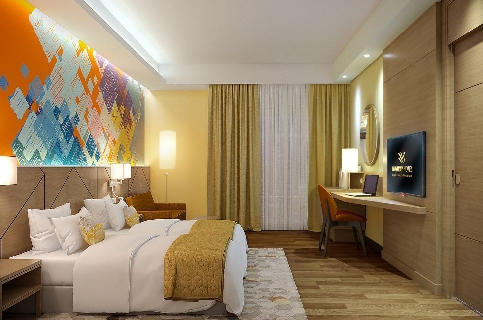 Deluxe Plus King Bedroom with a works desk and TV at Sunway Hotel Big Box