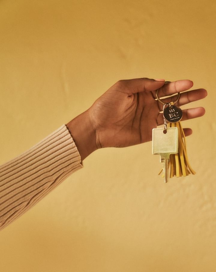 Closeup of keys with a yellow background at Brazilian Court
