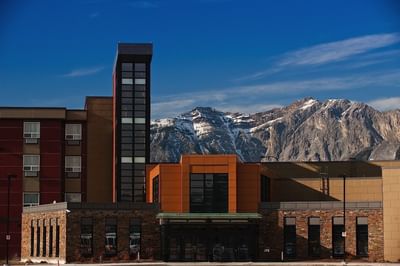 Hotel exterior with mountains in background