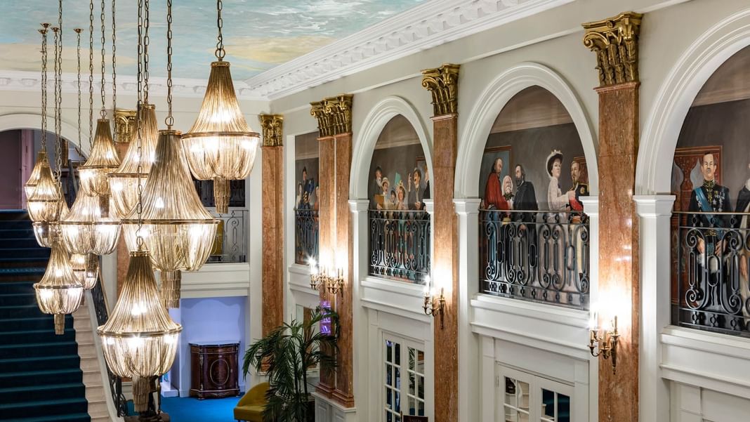 Lobby with balcony and chandelier, Oceania L'Univers Tours