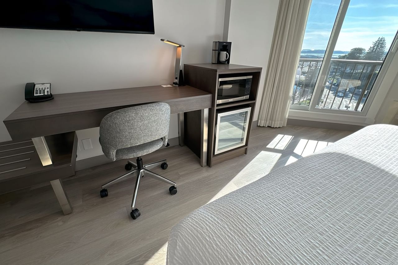 Hotel guestroom with work desk and chair