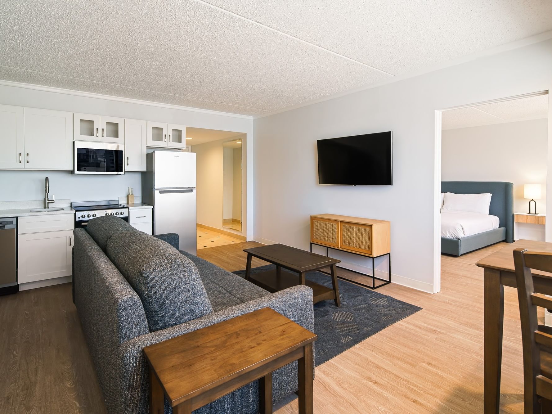 One Bedroom King Apartment with Kitchen featuring open living area and separate bedroom at Showboat Hotel & Resort