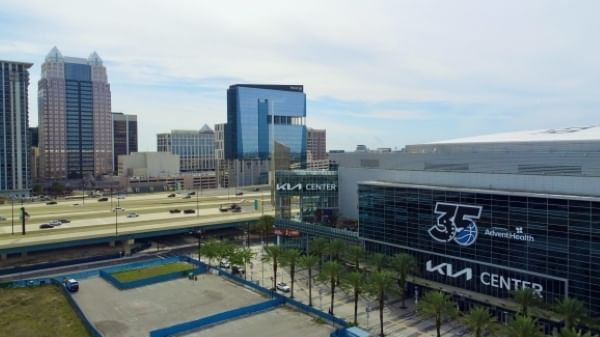 An aerial shot of the Kia Center and the downtown Orlando skyline. 