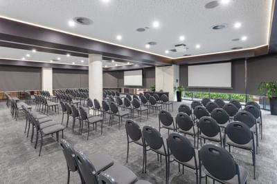 Theatre chairs in Bridge & Yarra Room at Amora Hotel Melbourne