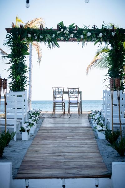 Wedding setting arranged on the beach at Playa Blanca Beach Resort