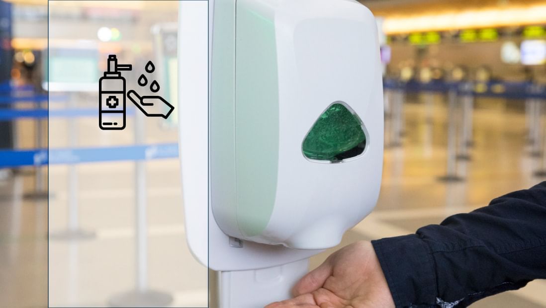 Hand with a sanitizer container at Hotel Plaza San Francisco