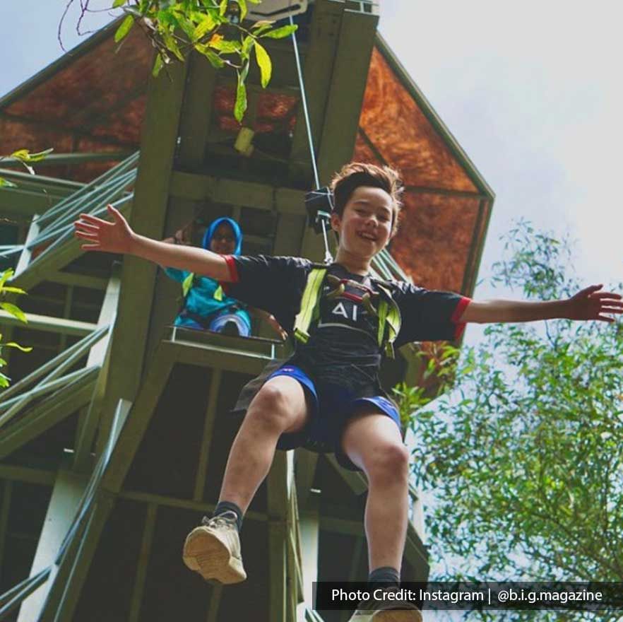 A kid was engaging a ziplining activity at Escape Penang - Lexis Suites Penang