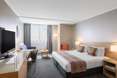 Bedroom interior of One Bedroom Apartments at Nesuto Hotels