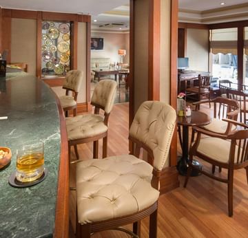 Bar counter with stools in Lobby Cafe & Bar at Titanic Comfort Sisli