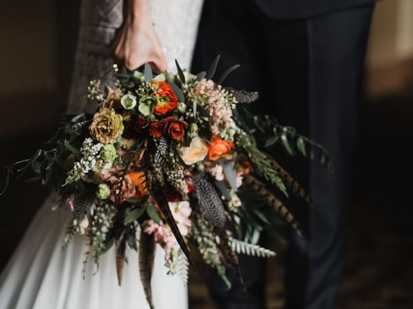 A wedding bouquet held by the bride at Alderbrook Resort & Spa