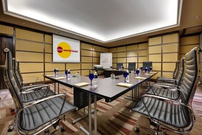 U-shape meeting room set-up with carpeted floors in the Business Center at One World Hotel