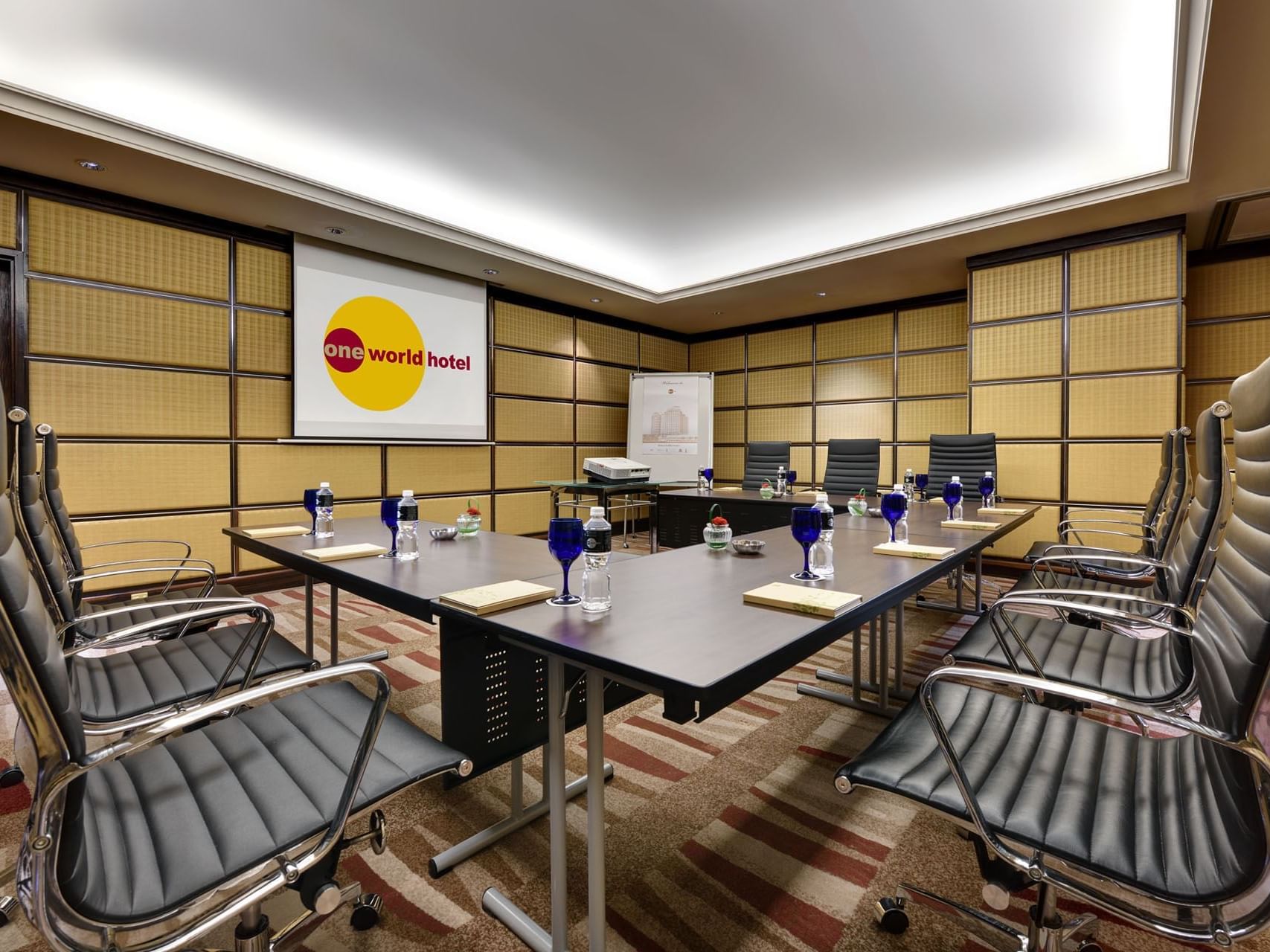 U-shape meeting room set-up with carpeted floors in the Business Center at One World Hotel