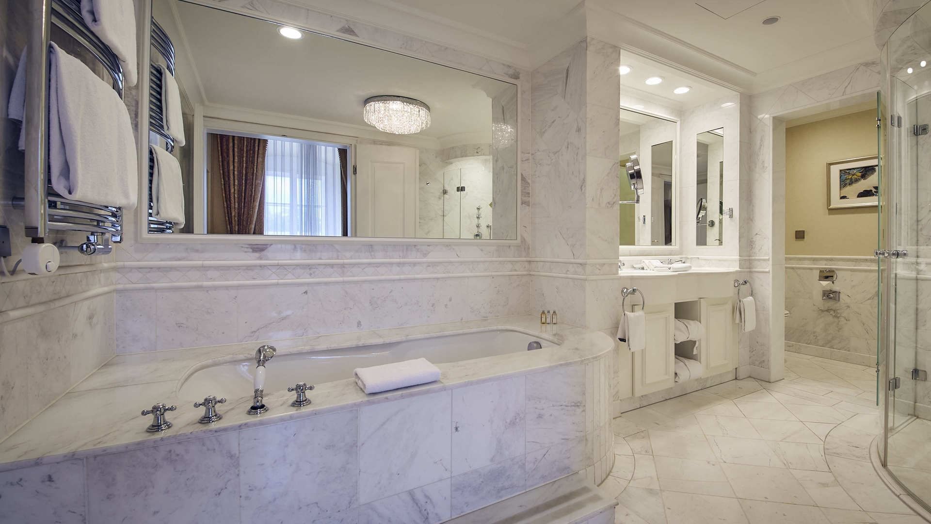 Bathroom marble bathtub in Schloss Suite, Falkensteiner Hotels