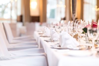 Nicely set table for festivities in Hotel Collegium Leoninum, Bonn