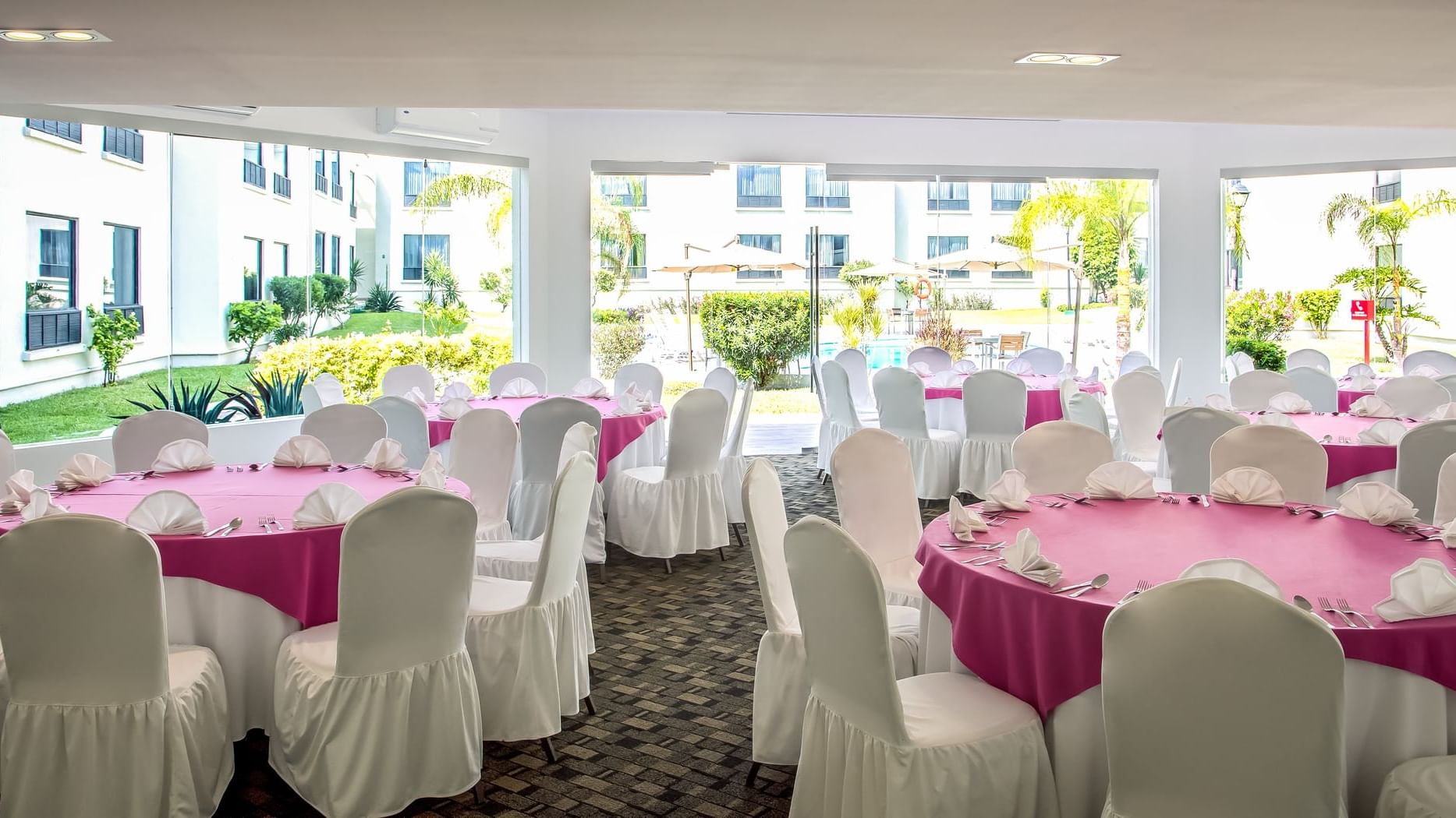 Dining table setup in banquet hall at FI Monterrey La Fe