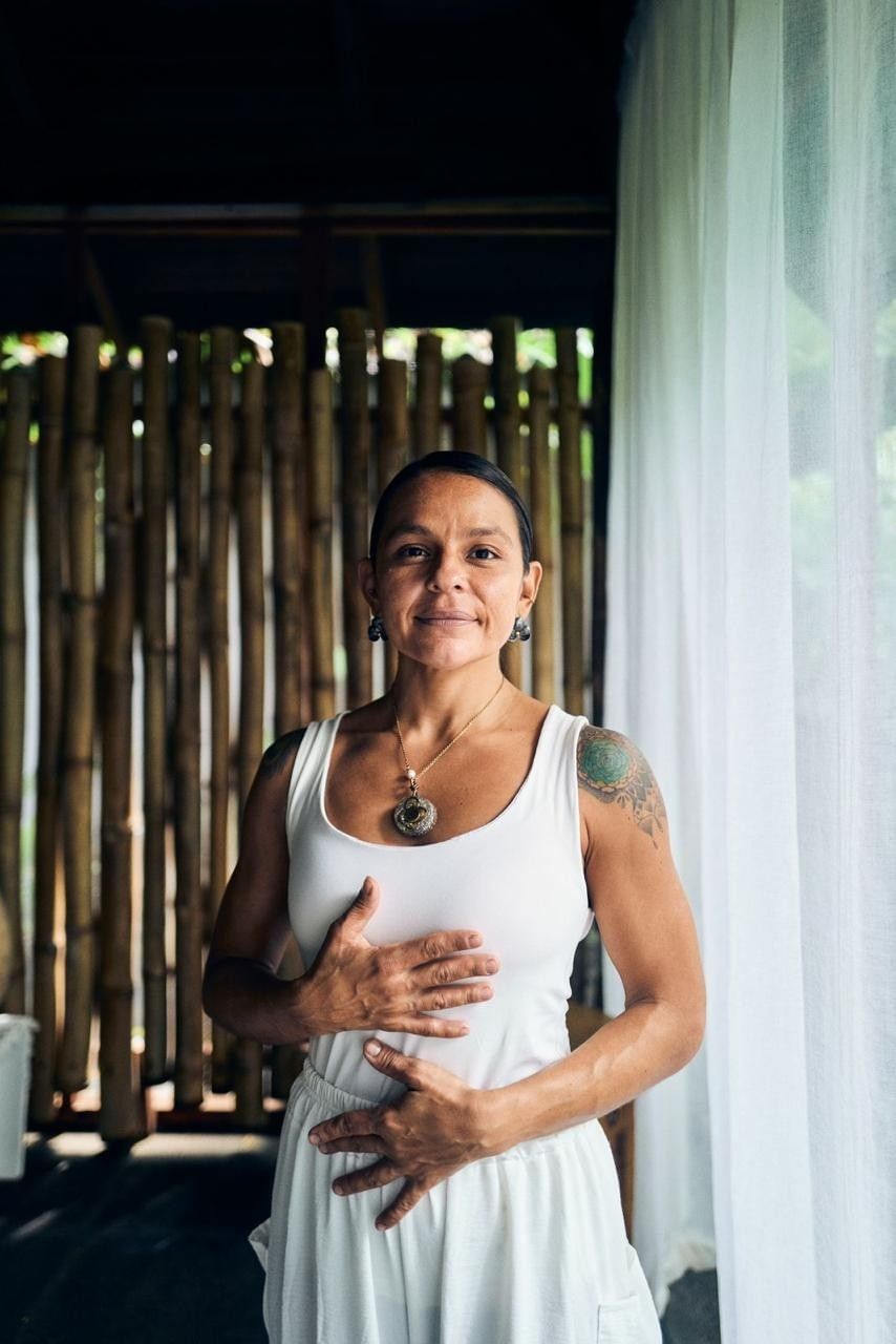 Portrait of a wellness expert in Lahari Wellness Center wearing white outfit at Cala Luna Boutique Hotel