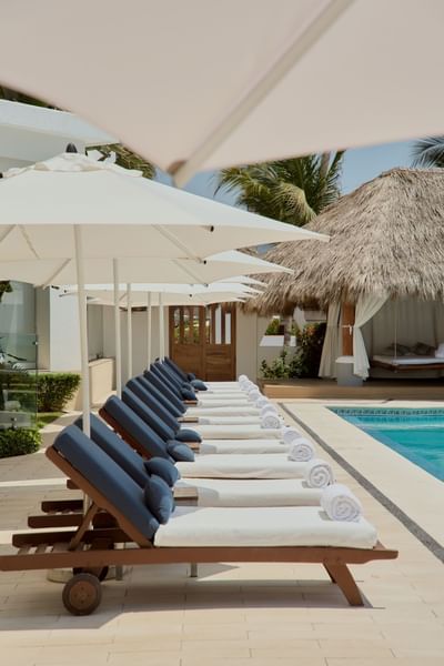 Close-up of sunbed line near the pool area at Villa Premiere Boutique Hotel & Romantic Getaway