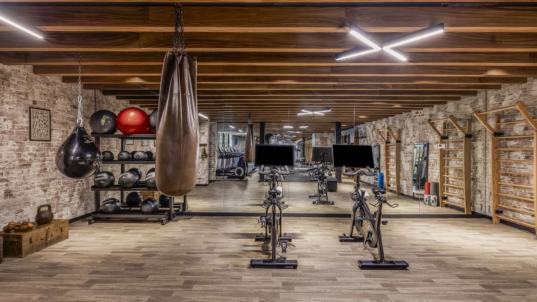 Well-equipped modern fitness center at Live Aqua San Miguel de Allende