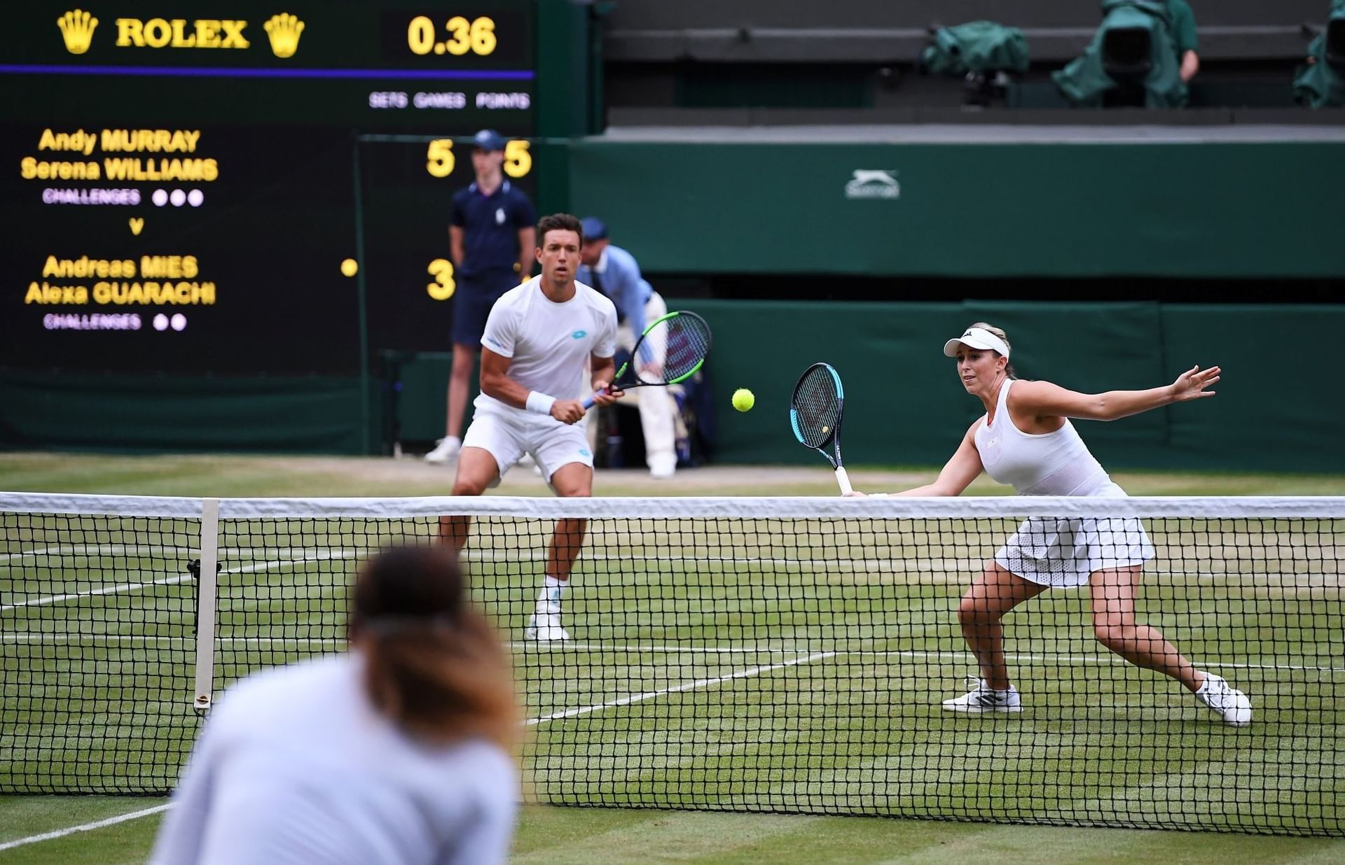 Alexa Guarachi Bruner in action on a tennis court at Wimbeldon.
