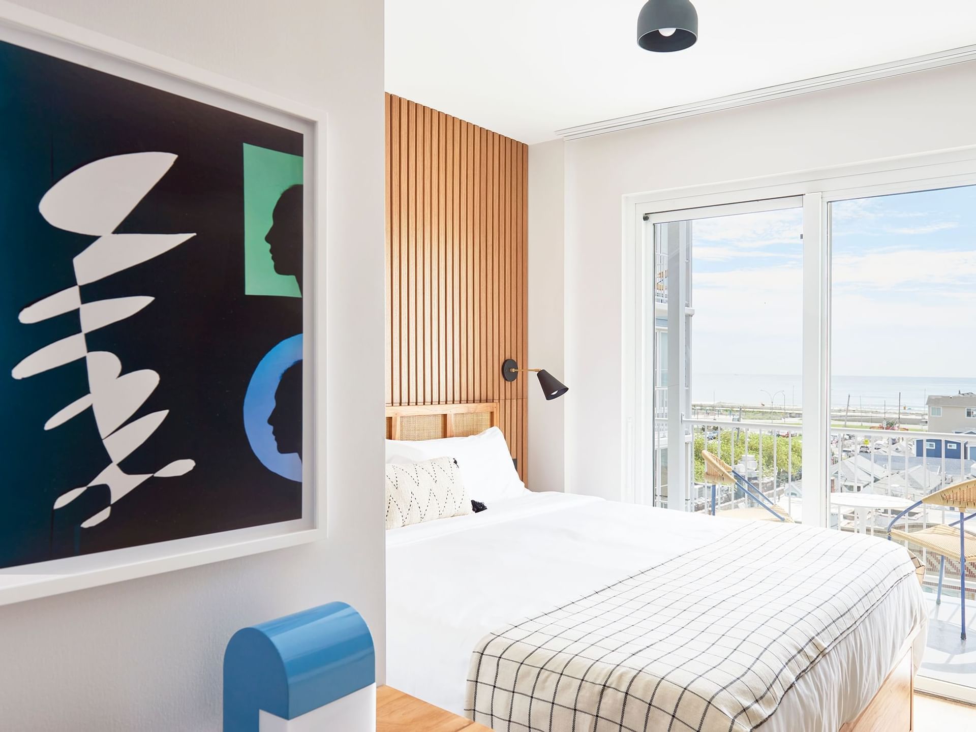 Bedroom in Standard King Ocean View room at The Rockaway Hotel