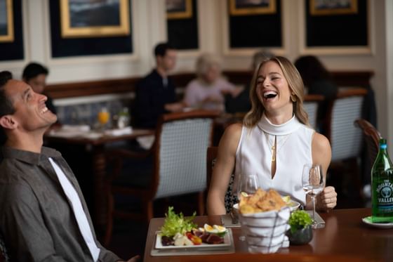 couple laughing in the restaurant