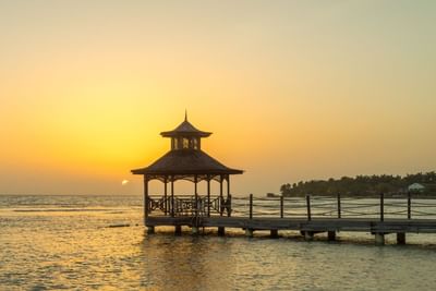 Gazebo & pier in the sea at sunset near Holiday Inn Montego Bay