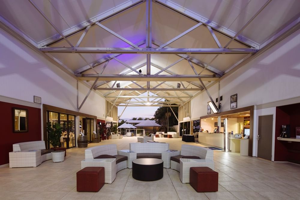 Stylish lobby at Mercure Townsville, with a welcoming reception desk and modern seating for a luxurious arrival experience