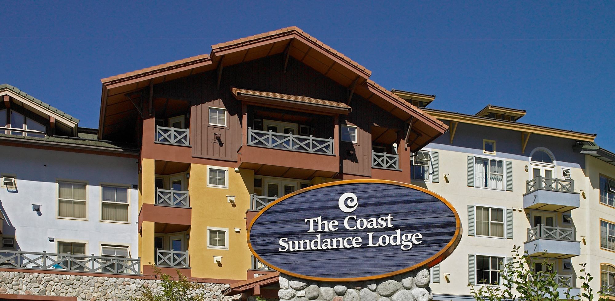 Coast Sundance Lodge exterior in the summer