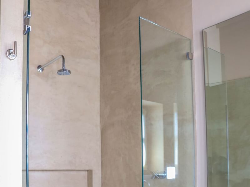Close-up of a shower cubicle in Deluxe Room at Gamma Hotels