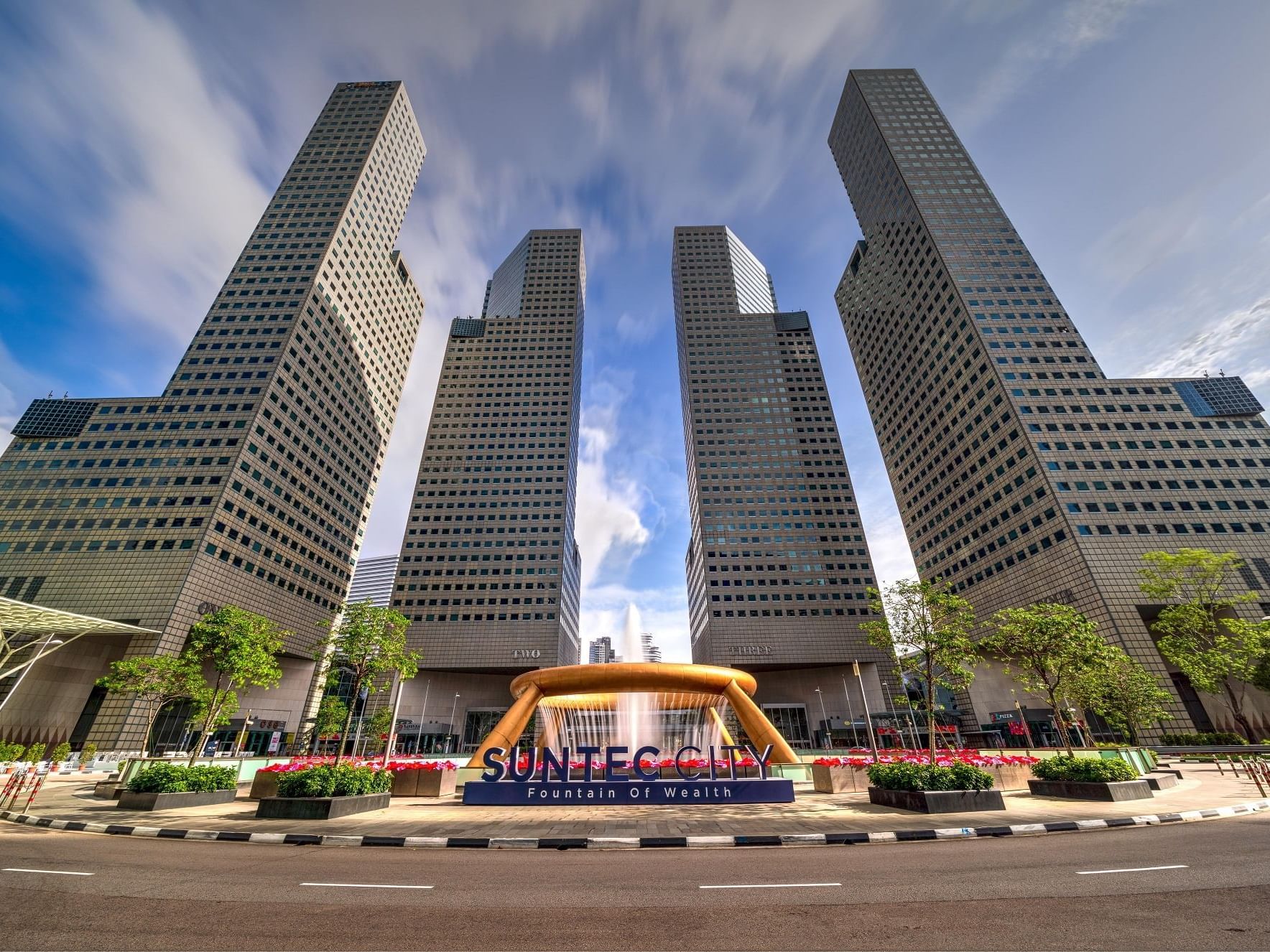 Low angle view of Suntec City near Carlton Hotel Singapore