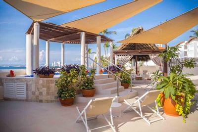 Sun loungers near hot tub at Buenaventura Grand Hotel