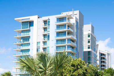 The Residences at Seafire, with multiple floors and balconies, surrounded by lush greenery