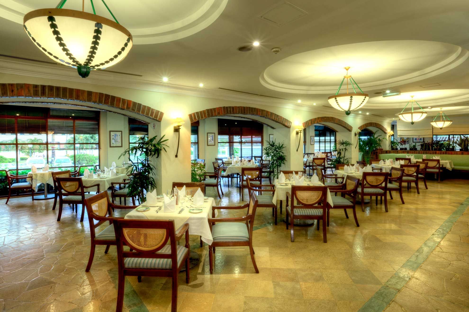 Dining tables arranged in Sun Cafe at Sunway Hotel Phnom Penh