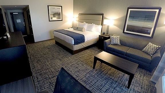 Cozy King Sofa room featuring a king bed and a sofa at Shangri-La Monkey Island