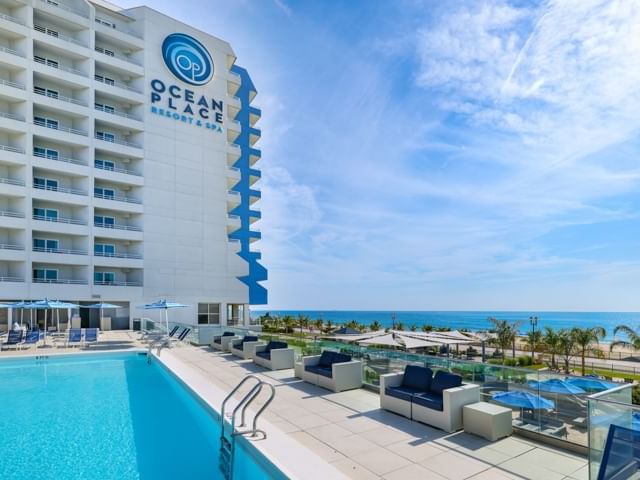 Hotel with outdoor pool and palm trees