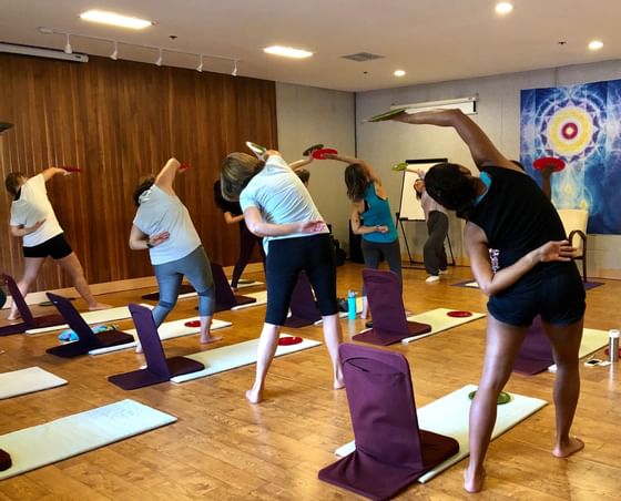 Women's indoor exercise session at Honor’s Haven Retreat