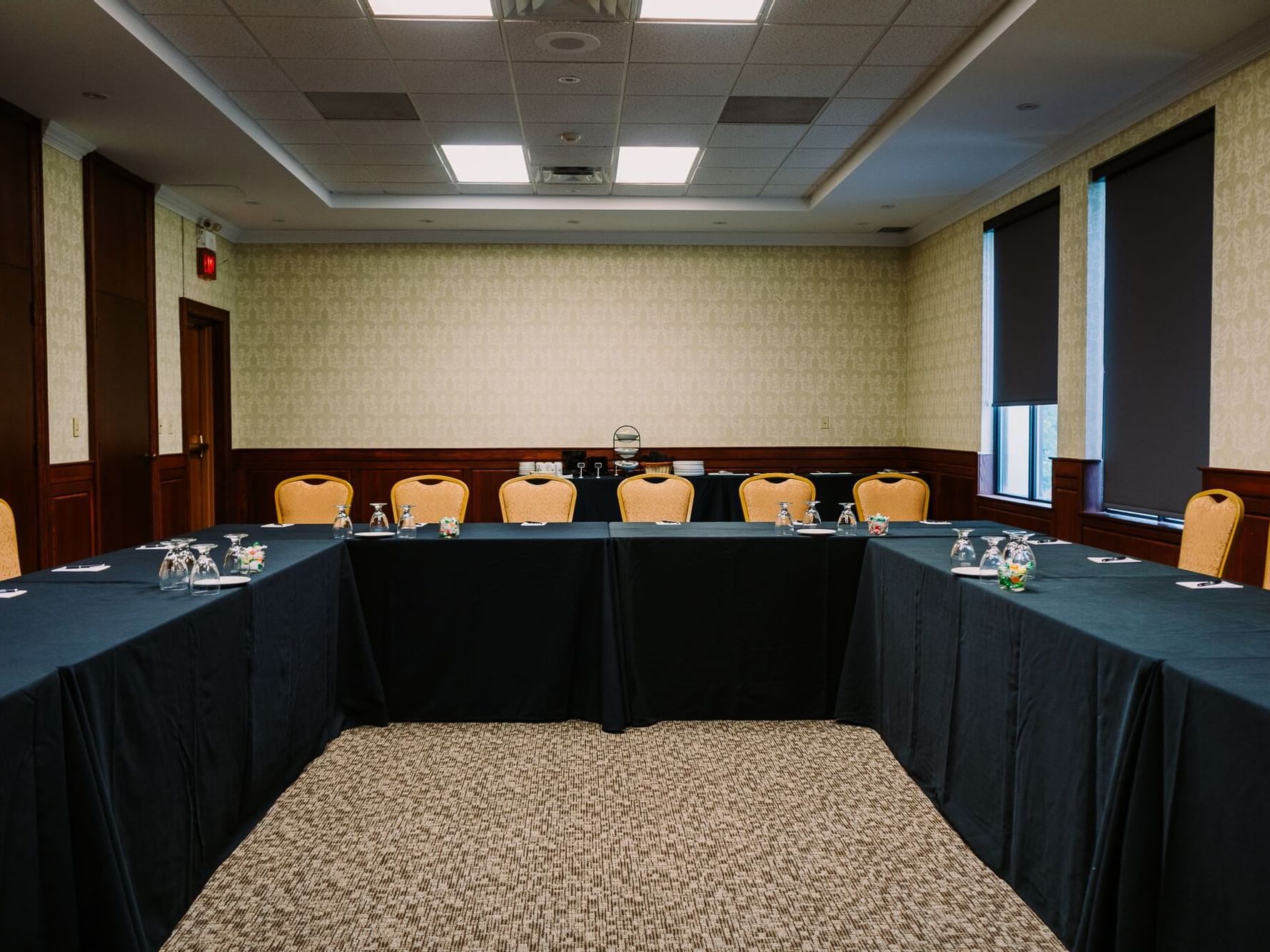 spacious conference hall with u table at The Inn of Waterloo
